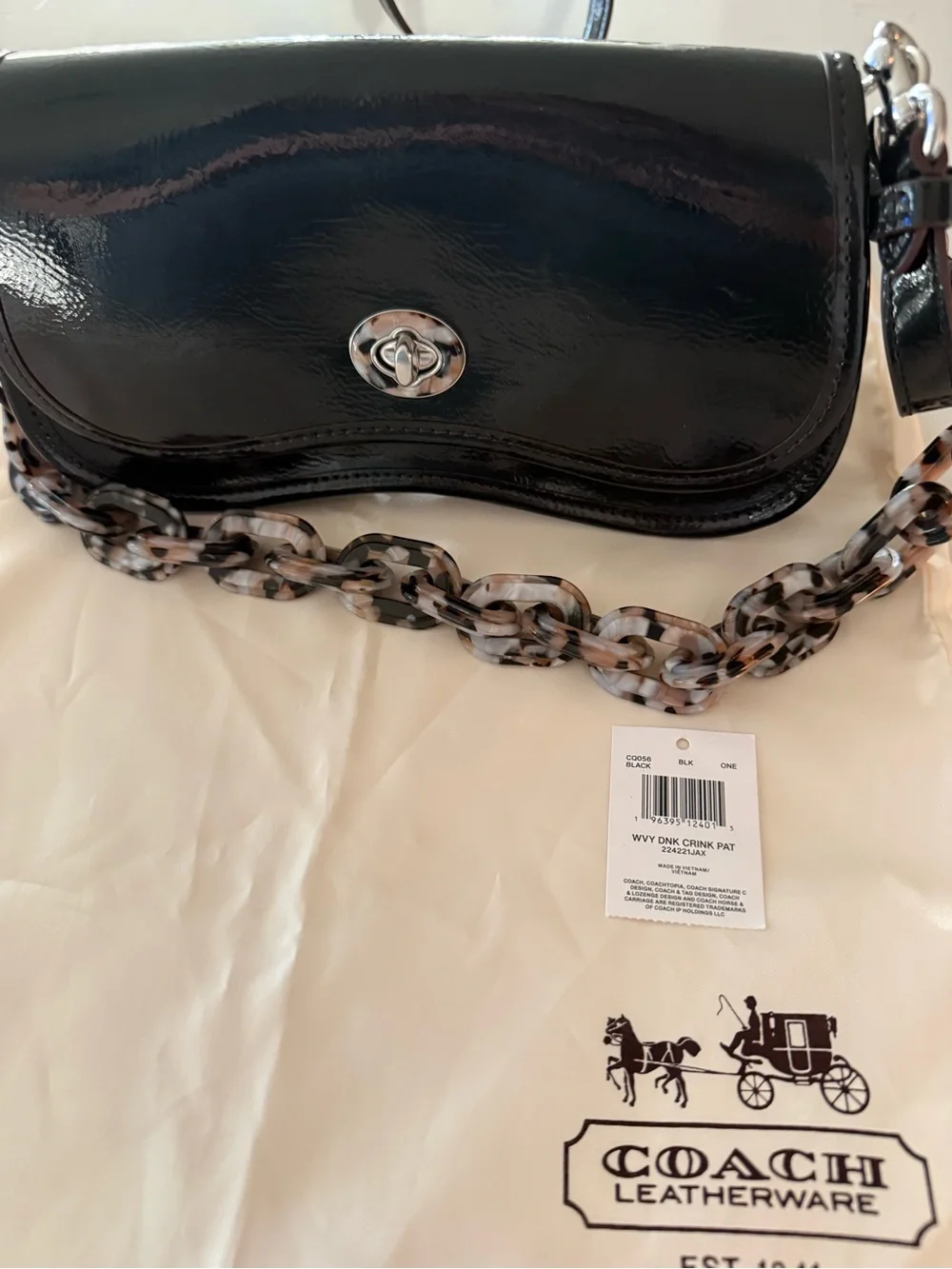 Coach sleek black